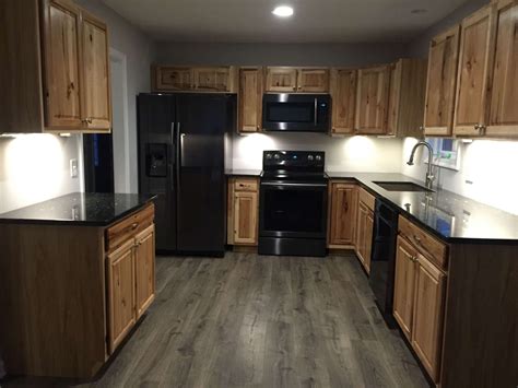 kitchen cabinet colors with black stainless steel appliances|hickory cabinets with black appliances.